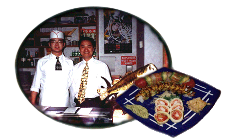 HKT’s original photograph of two restaurant staff members with a sushi presentation